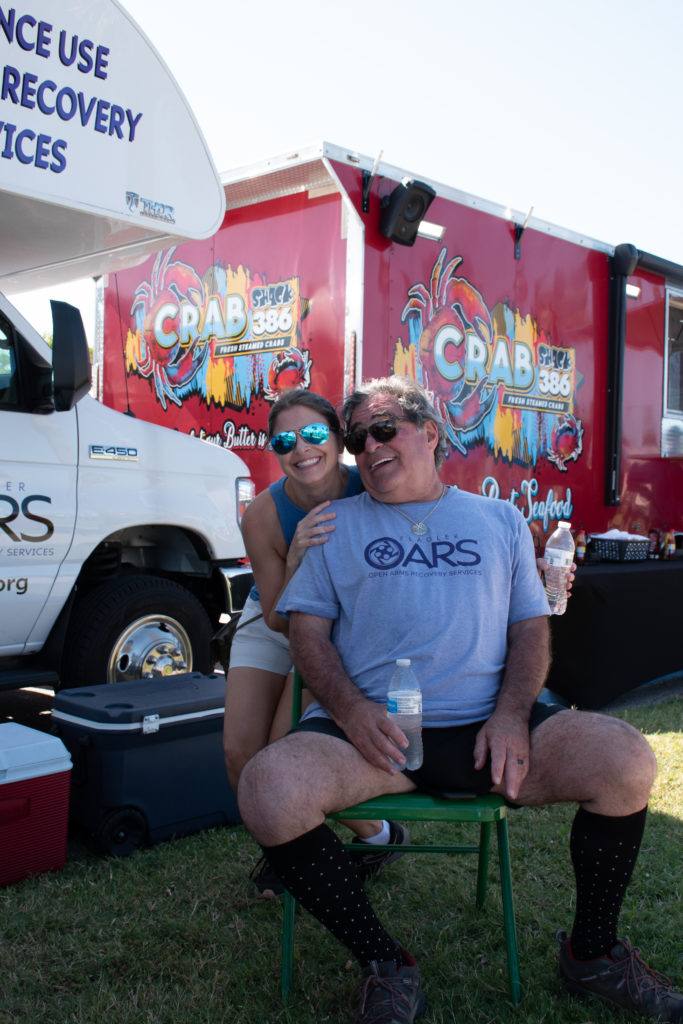 Flagler OARS Volunteers by their Bus 